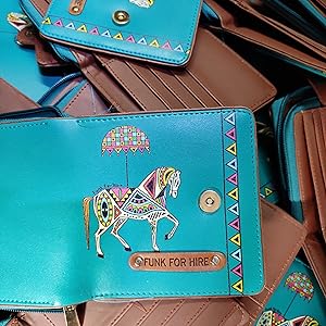 Pile of Horse printed loop wallets